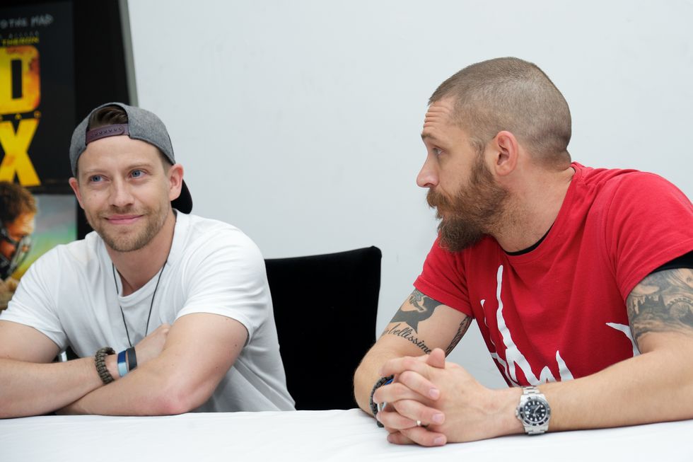hollywood, ca   may 02  tom hardy with his stunt double jacob tomuri at the mad max fury road press conference at siren studios on may 2, 2015 in hollywood, california  photo by vera andersonwireimage