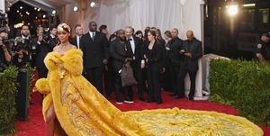 Yellow, Carpet, Flooring, Red carpet, Tradition, Dress, Fun, Event, Temple, 