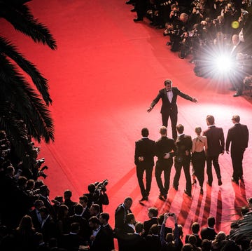 Red, Performance, Sky, Tree, Fashion, Crowd, Stage, Event, Performing arts, Silhouette, 