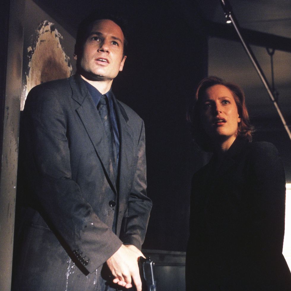 the x files season 7 agent fox mulder david duchovny, l and agent dana scully gillian anderson, r investigate circumstances around a man who seems to be just a little too lucky in the goldberg variation episode of the x files which originally aired sunday, dec 12 900 1000 pm etpt on fox photo by fox image collection via getty images