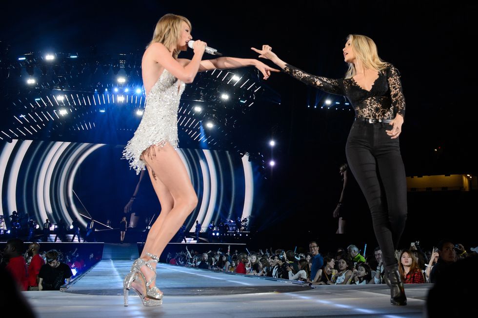 detroit, mi may 30 musician taylor swift l and model gigi hadid perform on stage during the 1989 world tour live at ford field on may 30, 2015 in detroit, michigan photo by larry busaccalp5getty images for tas
