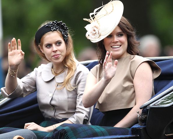 london, england   june 13  princess beatrice of york and princess eugenie of york wave at the crowd during the annual trooping the colour ceremony at horse guards parade on june 13, 2015 in london, england  photo by danny martindalewireimage