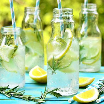 citrus fizz with rosemary in a bottle