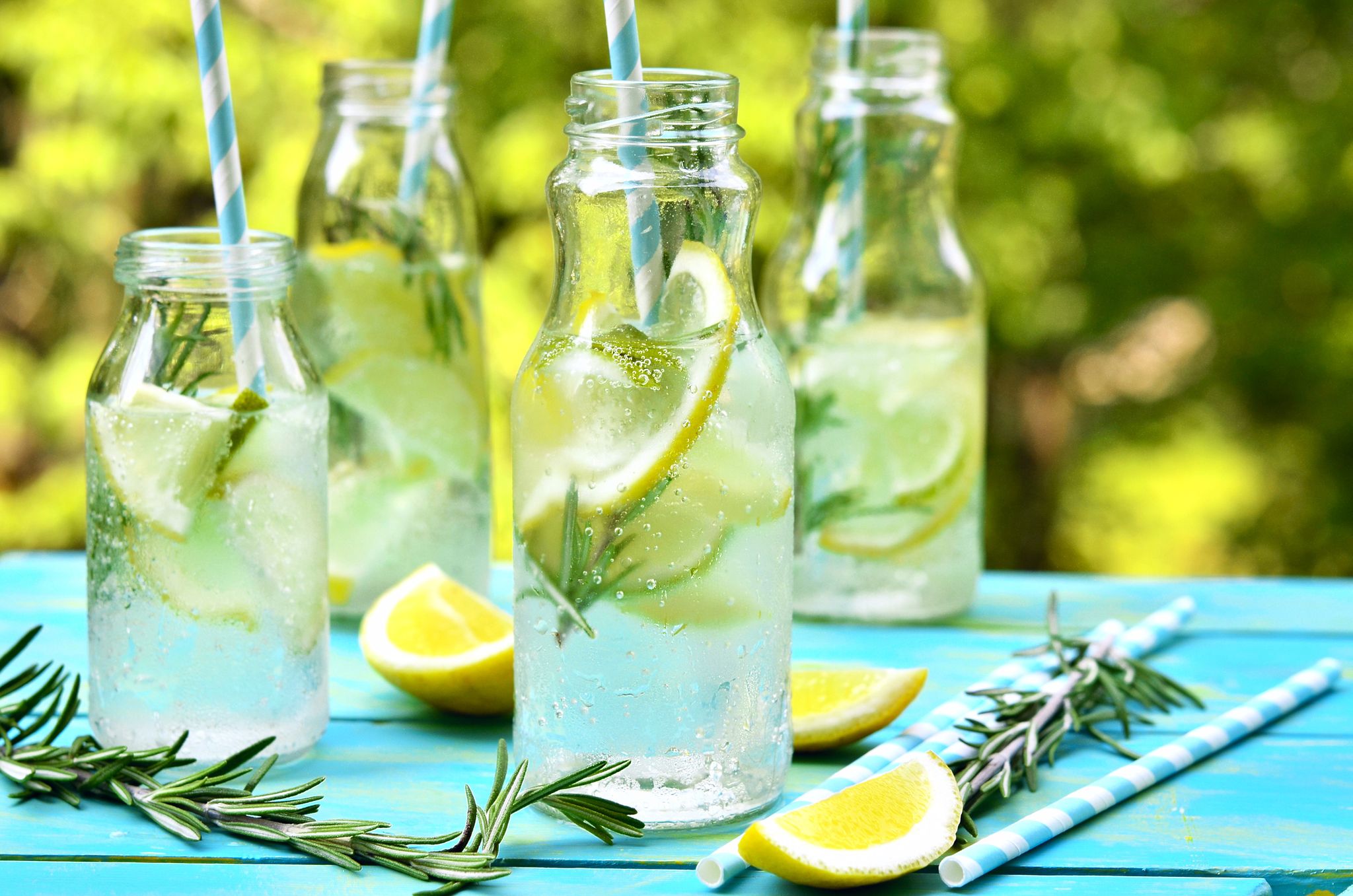 citrus fizz with rosemary in a bottle