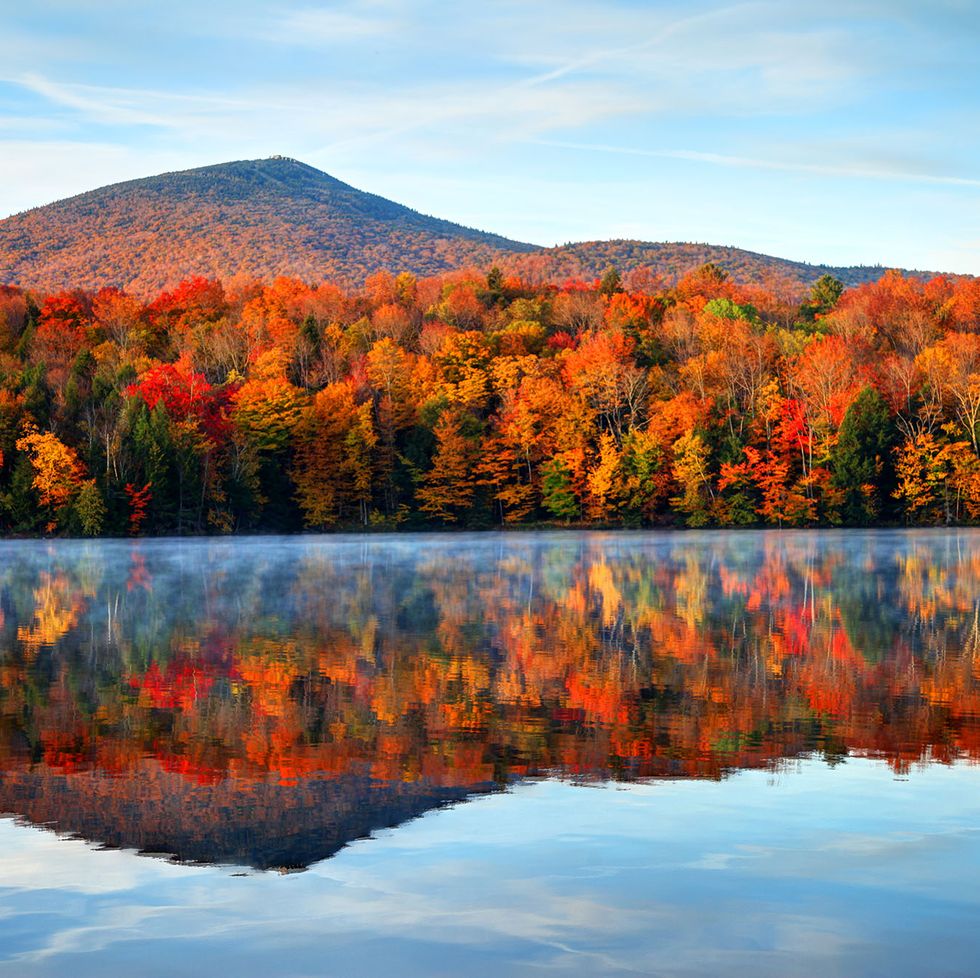 early morning autumn light near killington, vermont photo taken on a calm tranquil colorful morning during the peak autumn foliage season vermont's beautiful fall foliage ranks with the best in new england bringing out some of  the most colorful foliage in the united states