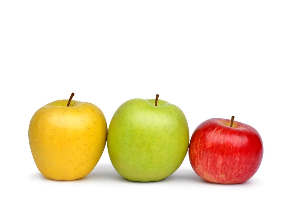 yellow, green and red apple isolated on white background