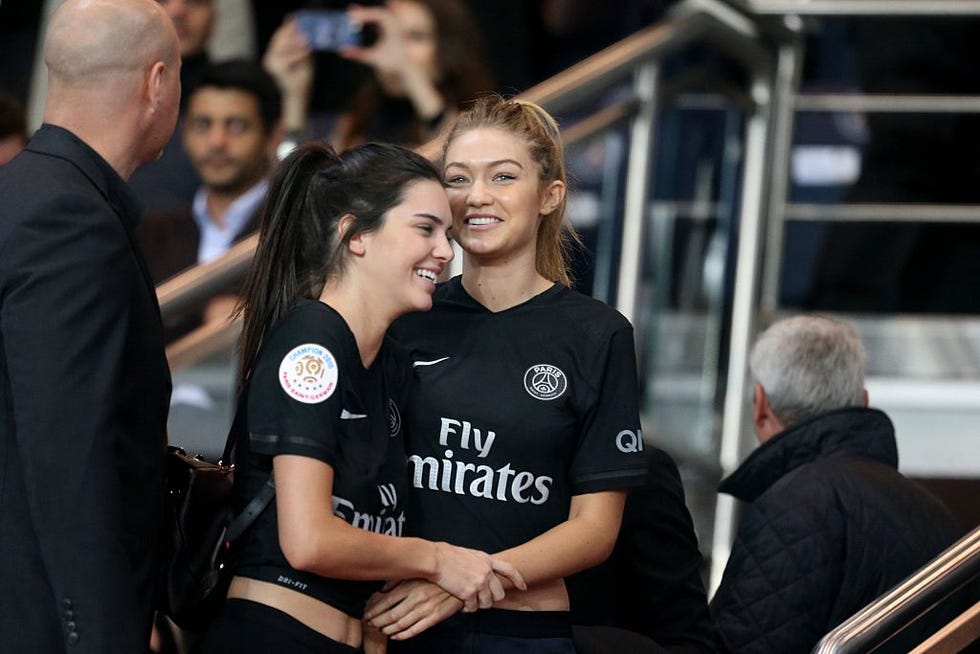 paris, france october 04 kendall jenner and gigi hadid attends the french ligue 1 between paris saint germain and olympique de marseille at parc des princes on october 4, 2015 in paris, france photo by xavier lainegetty images