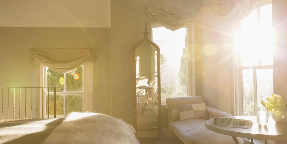 Sun shining in luxury bedroom