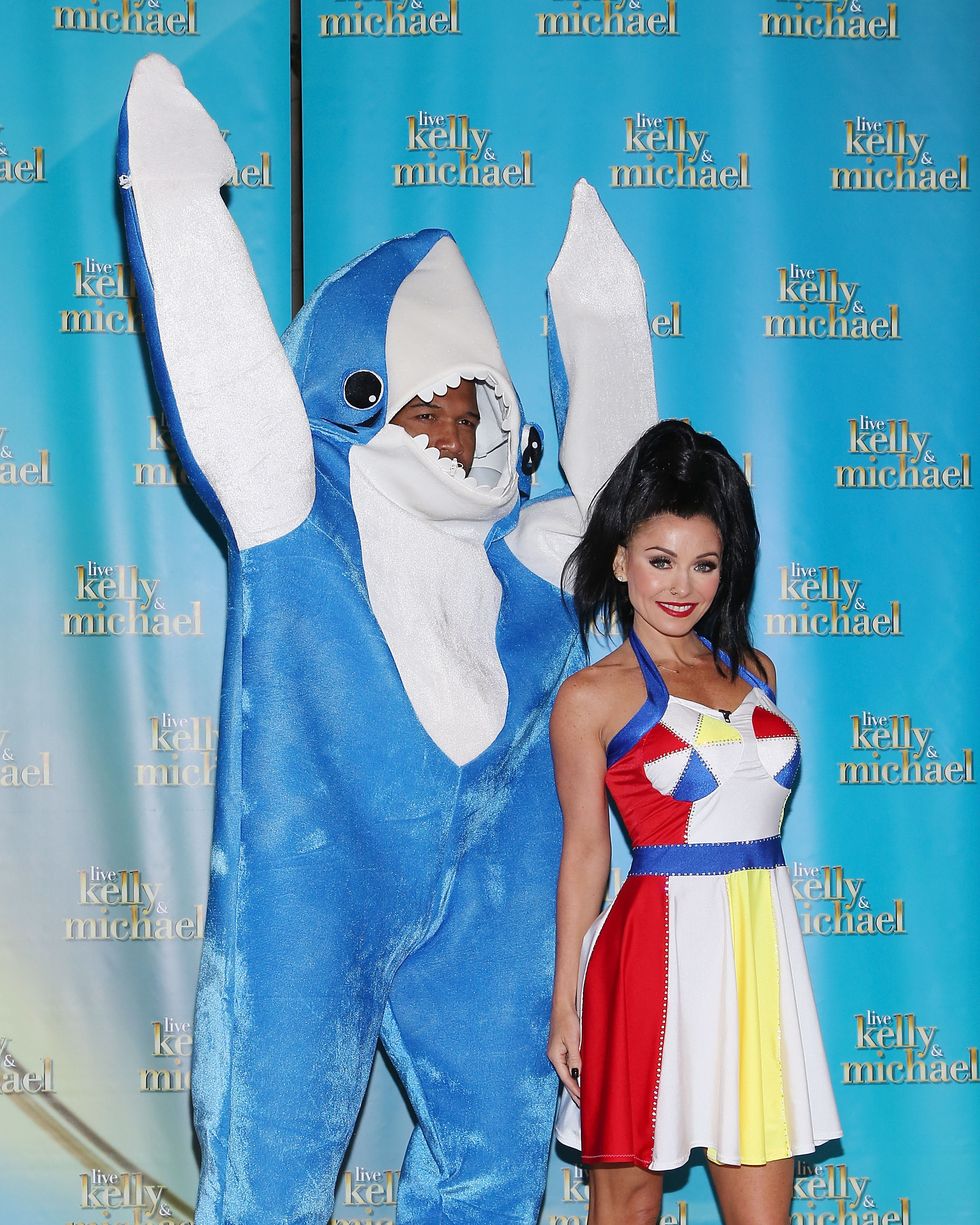 new york, ny october 30 michael strahan as left shark and kelly ripa as katy perry on the super bowl halftime show attend a photocall outside the live with kelly and michael studios on october 30, 2015 in new york city photo by taylor hillwireimage