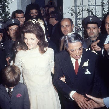 view of american editor and former first lady jacqueline kennedy onassis 1929   1994 center and her husband, shipping magnate aristotle onassis 1906   1975 right immediatetly after their wedding, scorpios, greece, october 20, 1968 kennedys son, john kennedy jr 1960   1999, is at left, fore photo by bill raythe life picture collection via getty images