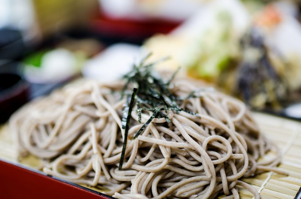 buckwheat noodle, served cold with a dash of wasabi and a simple sauce