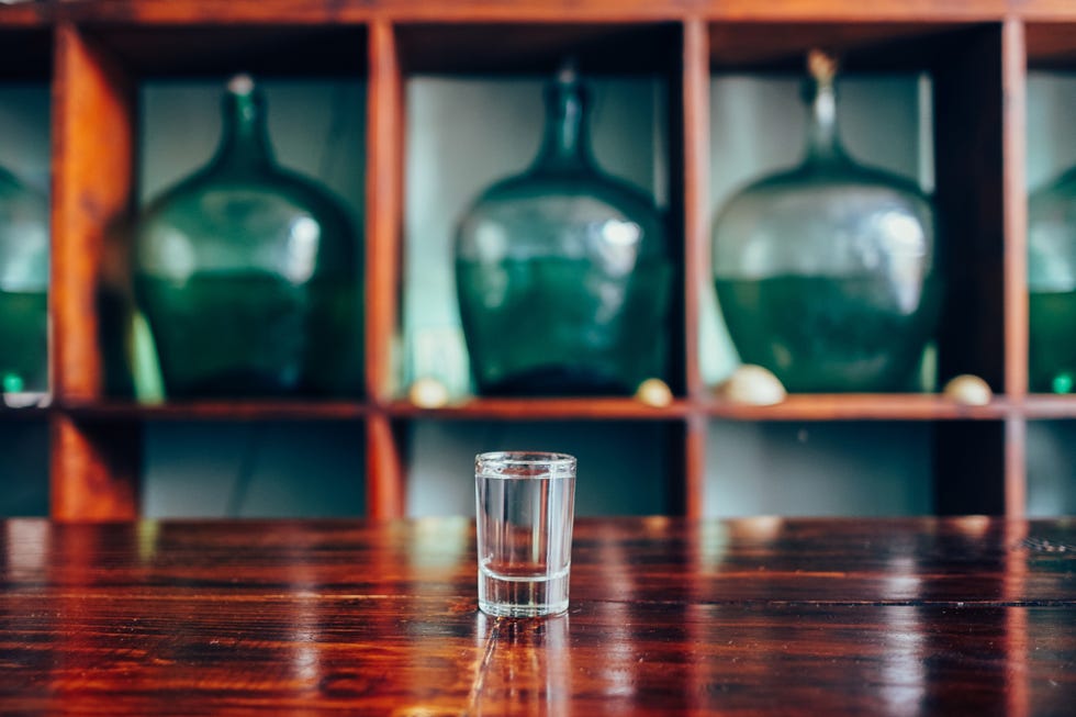 a glass of mezcal