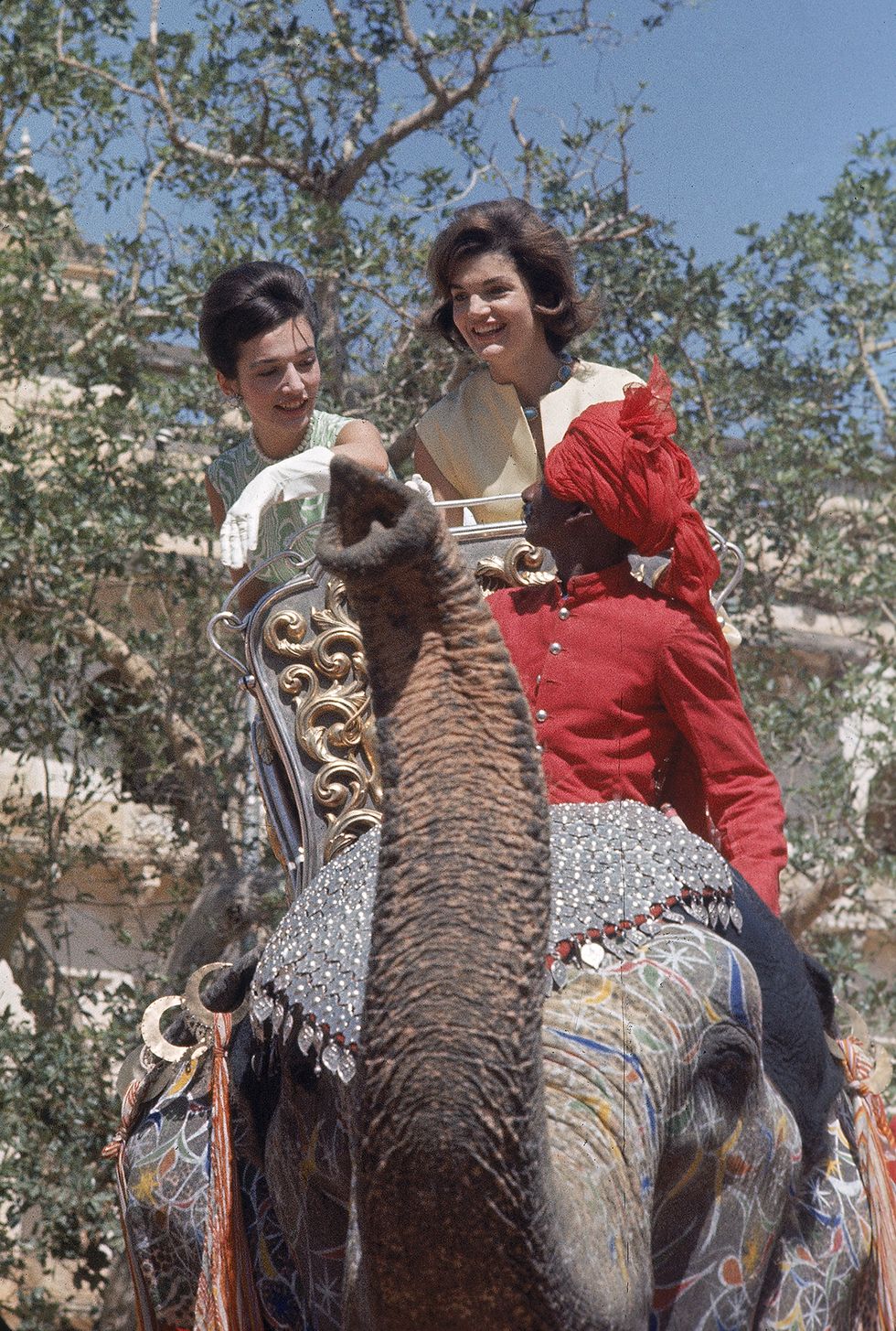 american first lady jacqueline kennedy 1929   1994 right and her younger sister lee radziwill smile as they ride an elephant while on a trip in india, 1962 photo by art rickerbythe life picture collection via getty images