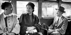 Rosa Parks riding on a newly-integrated bus