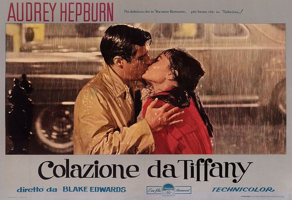 an italian poster for blake edwards 1961 romantic comedy breakfast at tiffanys colazione da tiffany starring audrey hepburn and george peppard photo by movie poster image artgetty images
