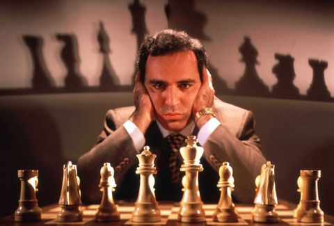 chess champion gary kasparov contemplating board, training for his may rematch w smarter version of deep blue, ibm computer that spooked him last yr  photo by ted thaithe life picture collection via getty images