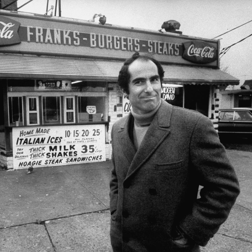 author, philip roth, revisiting areas where he grew up in newark, standing at hamburger stand  photo by bob petersonthe life images collection via getty imagesgetty images