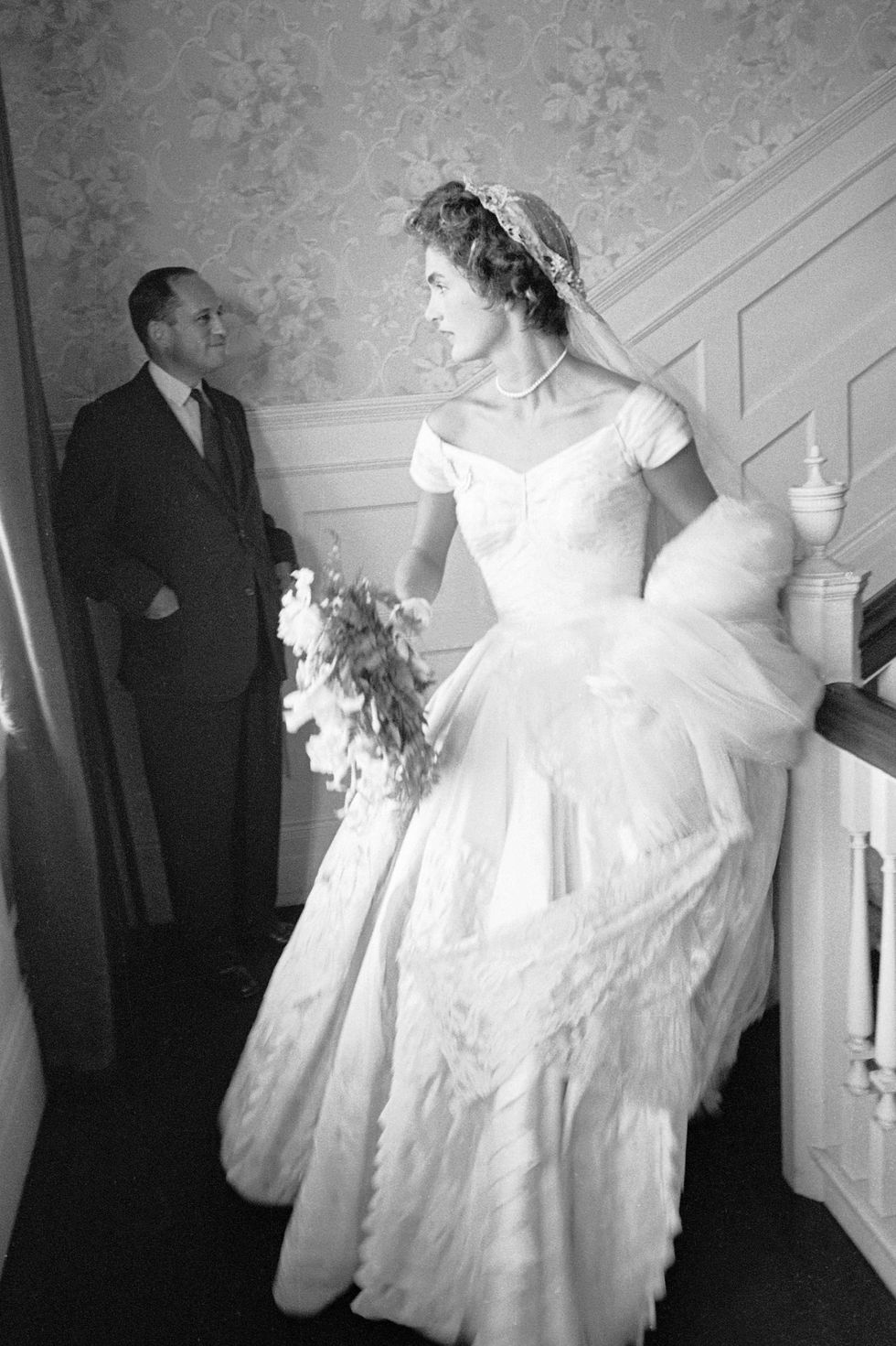 socialite jacqueline bouvier in wedding dress on landing in home on day of her marriage to sen john kennedy  photo by lisa larsenthe life picture collection via getty images