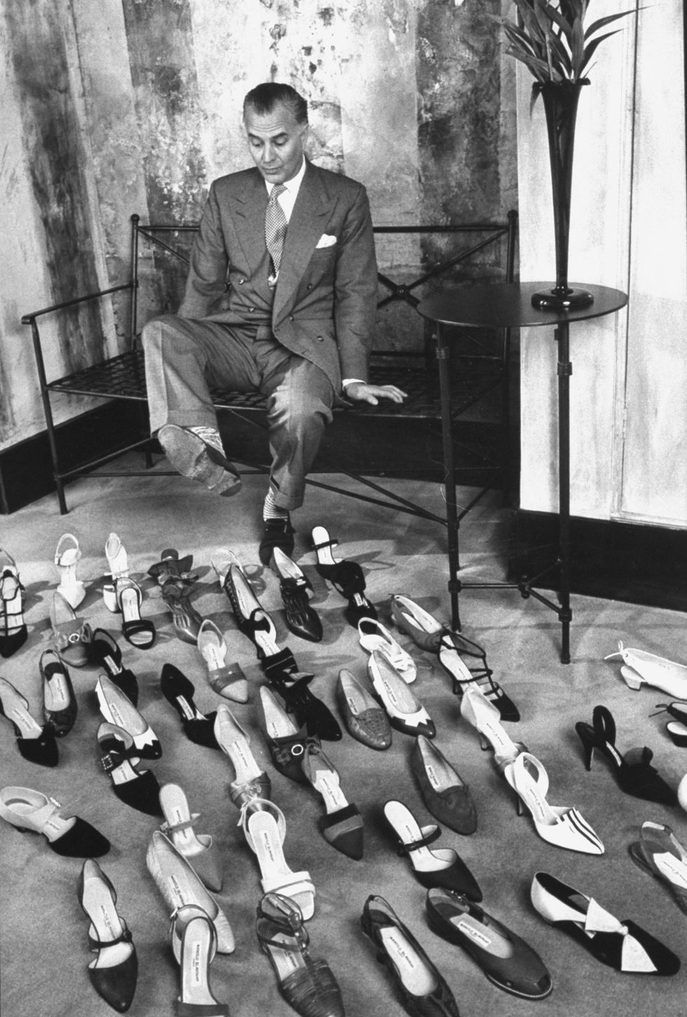 british shoe designer manolo blahnik with dozens of his shoes in his salon    photo by ian cookgetty images