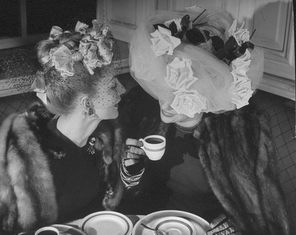 models wearing extravagant hats photo by george kargergetty images