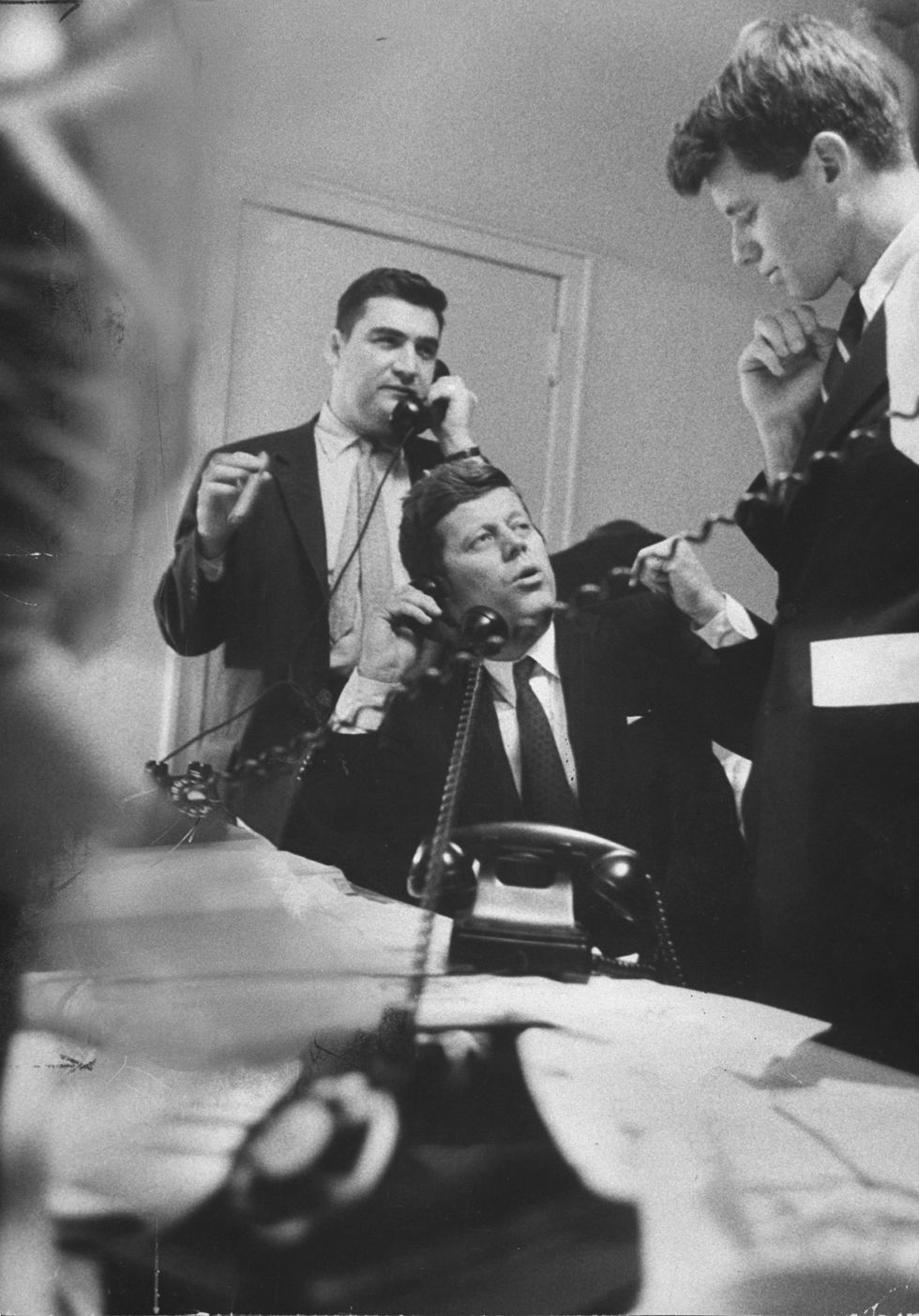 sen john f kennedy c in campaign headquarters on primary election night with his brother robert f kennedy r  photo by stan waymanthe life picture collection via getty images