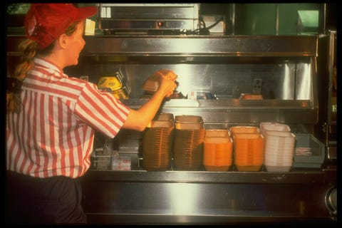 Girl behind counter at McDonald's restau girl behind counter at mcdonalds restaurant packing food into polystyrene boxes that the fast food chain says it will phase out regarding their harm to environment photo by mario ruizthe life images collection via getty imagesgetty images