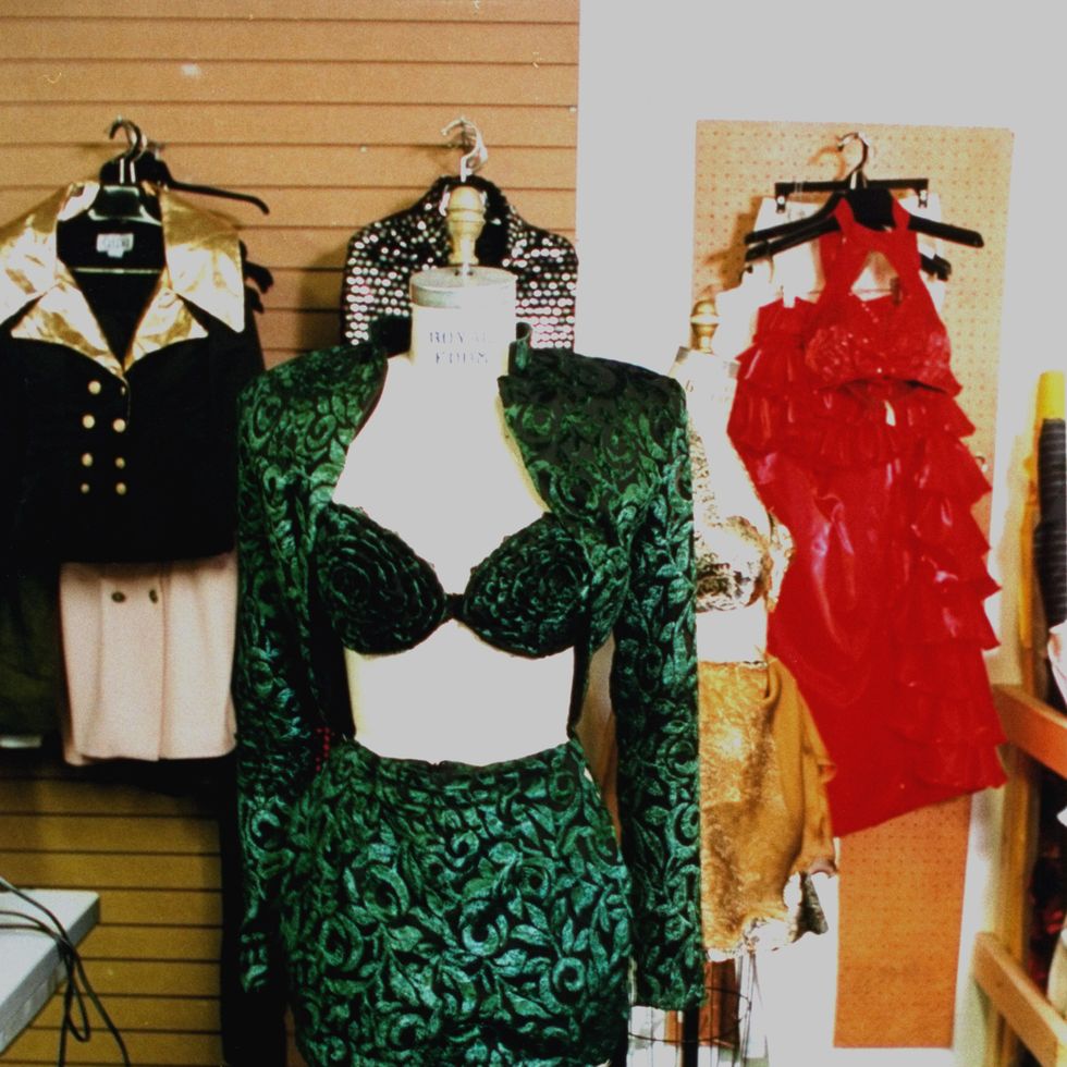 A crushed velvet green floral bustier, bolero jacket and miniskirt worn by Selena