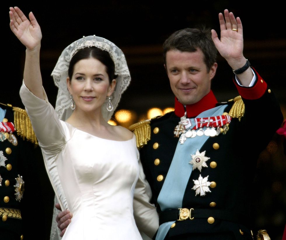 copenhagen, denmark may 14 crown princess mary and crown prince frederik of denmark wave from the balcony of christian vii's palace after their wedding may 14, 2004 in copenhagen, denmark the romance began in 2000 when mary donaldson met the heir to one of europe's oldest monarchies over drinks at the sydney olympics, where he was with the danish sailing team photo by ian waldiegetty images local caption crown princess marycrown prince frederik