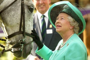 windsor, england   may 15  queen elizabeth ii attends the third day of the royal windsor horse show at home park on may 15, 2004 in windsor, england photo by carl de souzagetty images