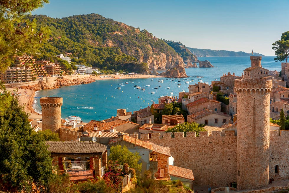 aerial view of fortress vila vella and badia de tossa bay at summer in tossa de mar on costa brava, catalunya, spain