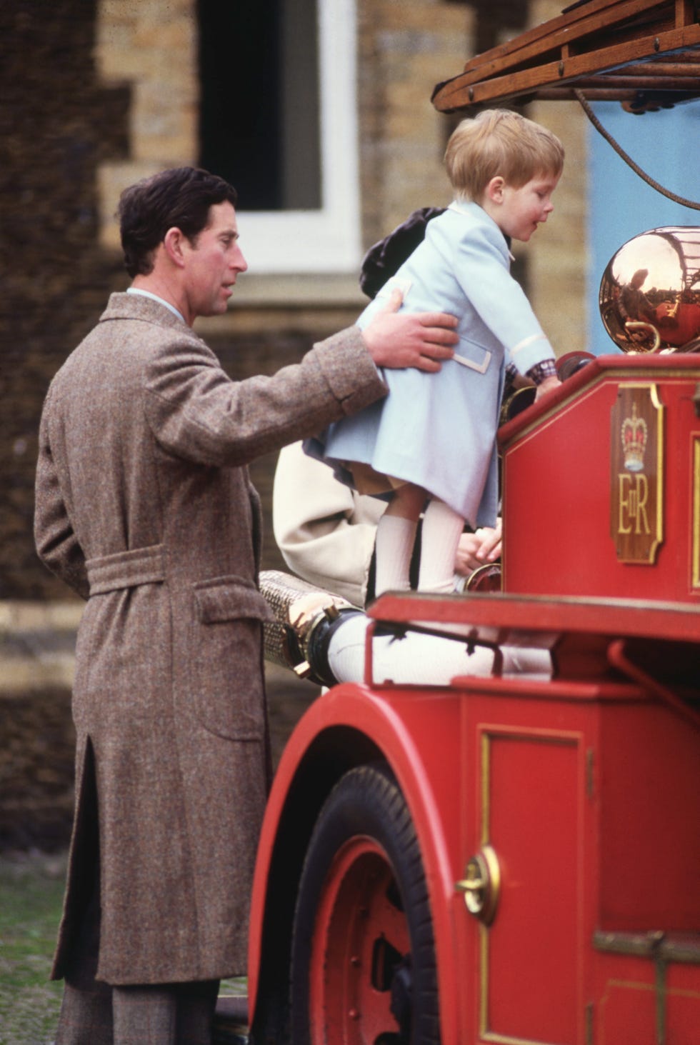 prince charles holding prince harry