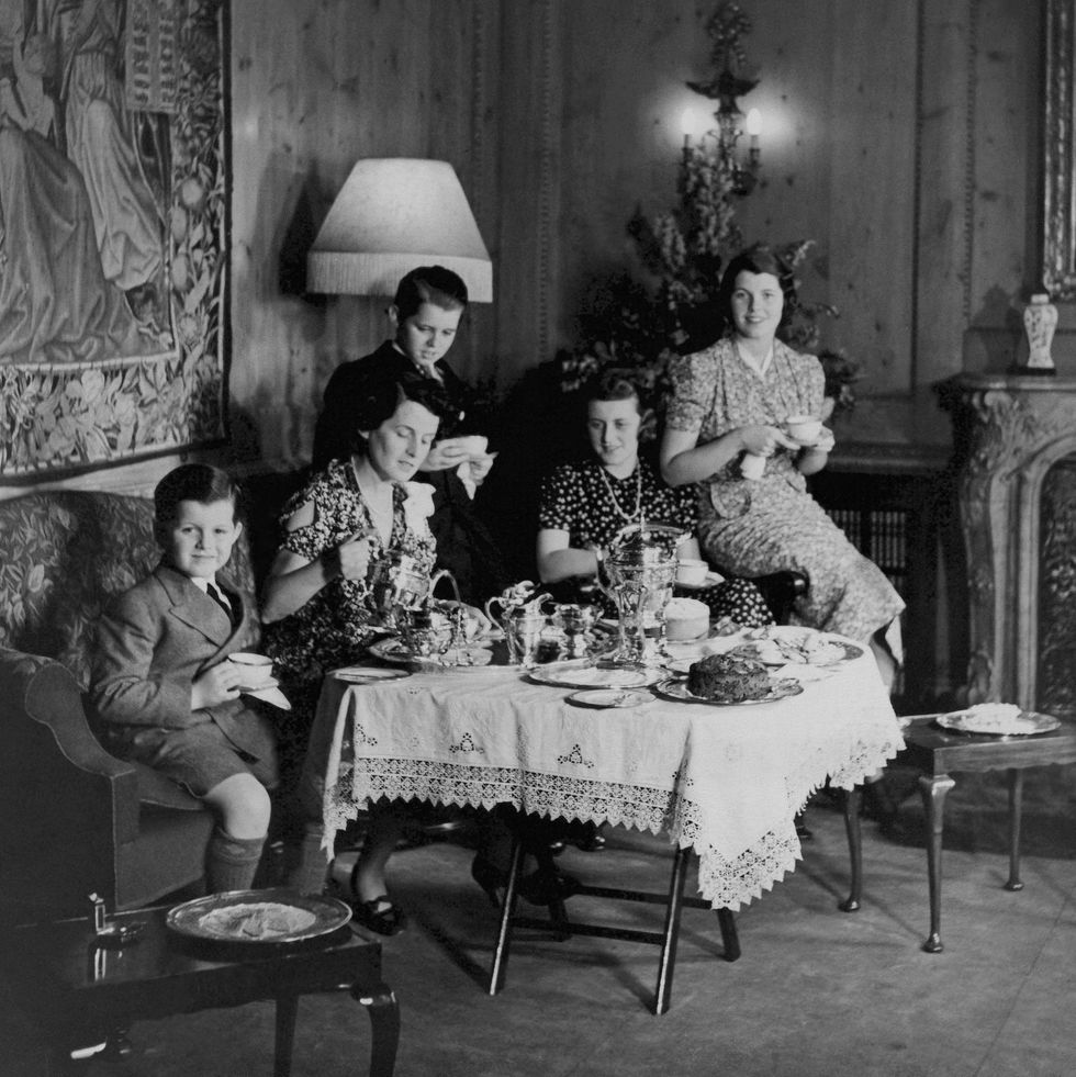 Rose Kennedy has tea with Teddy, Bobbie, Kathleen, and Rosemary in 1938.