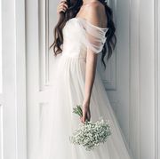 Clothing, Dress, Shoulder, Photograph, Joint, White, Bridal clothing, Elbow, Wedding dress, Petal, 