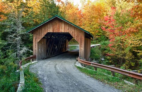 Creamery Bridge with fall foliage, Montgomery, Vermont, USA