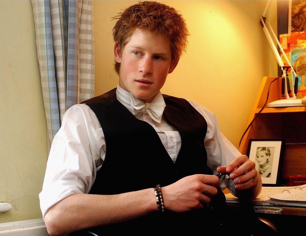 prince harry relaxes in his room at eton college in march 2003