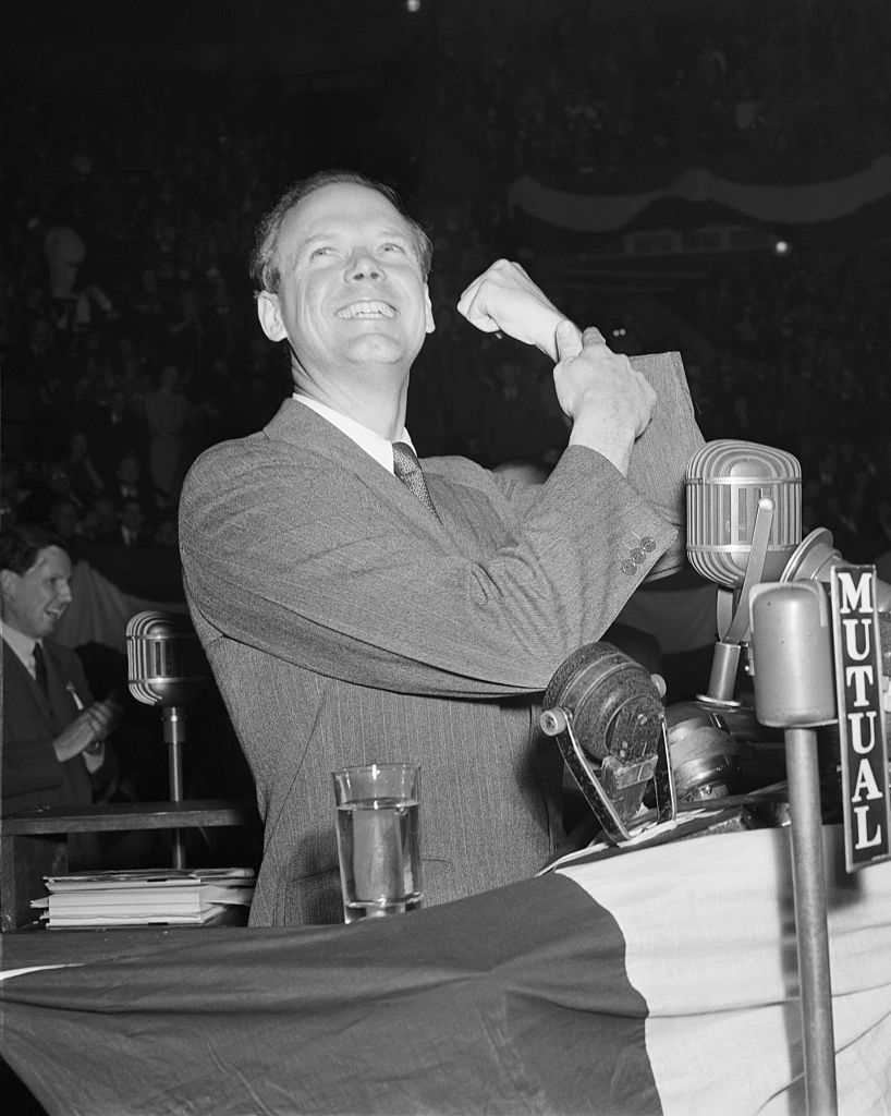 charles lindbergh greets the crowd with a triumphant gesture at an america first rally at madison square garden in manhattan