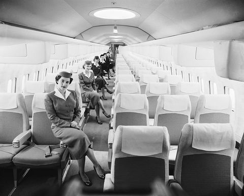 original caption 3211956 new york, ny mockup of tomorrrows jet comfort gracing the luxurious mockup of the boeing jet stratoliner, which will enter service with airlines of the world in 1959, are a group of airline stewardesses the half million dollar mockup is the first such jet transport interior to be completed in america and was unveiled on the eigth floor of a manhattan building it seats 98 passengers, has airconditioning, lighting system, running water, ovens, and refrigerators each seat has individual air inlets, reading lights, stewardess call butons and emergency outlets for each passenger