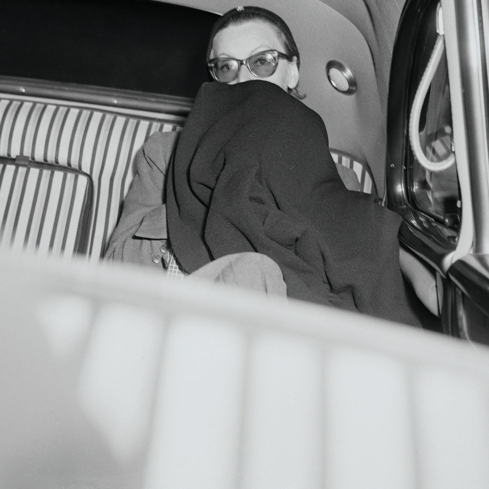original caption new york garbo arrives  short on conversation the ever elusive greta garbo, wearing dark glasses, had little to say to reporters as she entered a limousine at idlewild airport on her arrival today the swedish ex actress of the silent screen flew in from europe on a plane that carried aristotle onassis, greek shipping magnate, and george schlee, a frequent escort of miss garbo