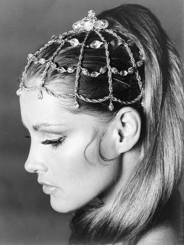 original caption 7151969 new york, ny jewelry goes to the head with a romantic juliet cap, a soft little headdress fashioned of golden metal chain and teardrop swarovski rhinestones the fashion gem is from napier