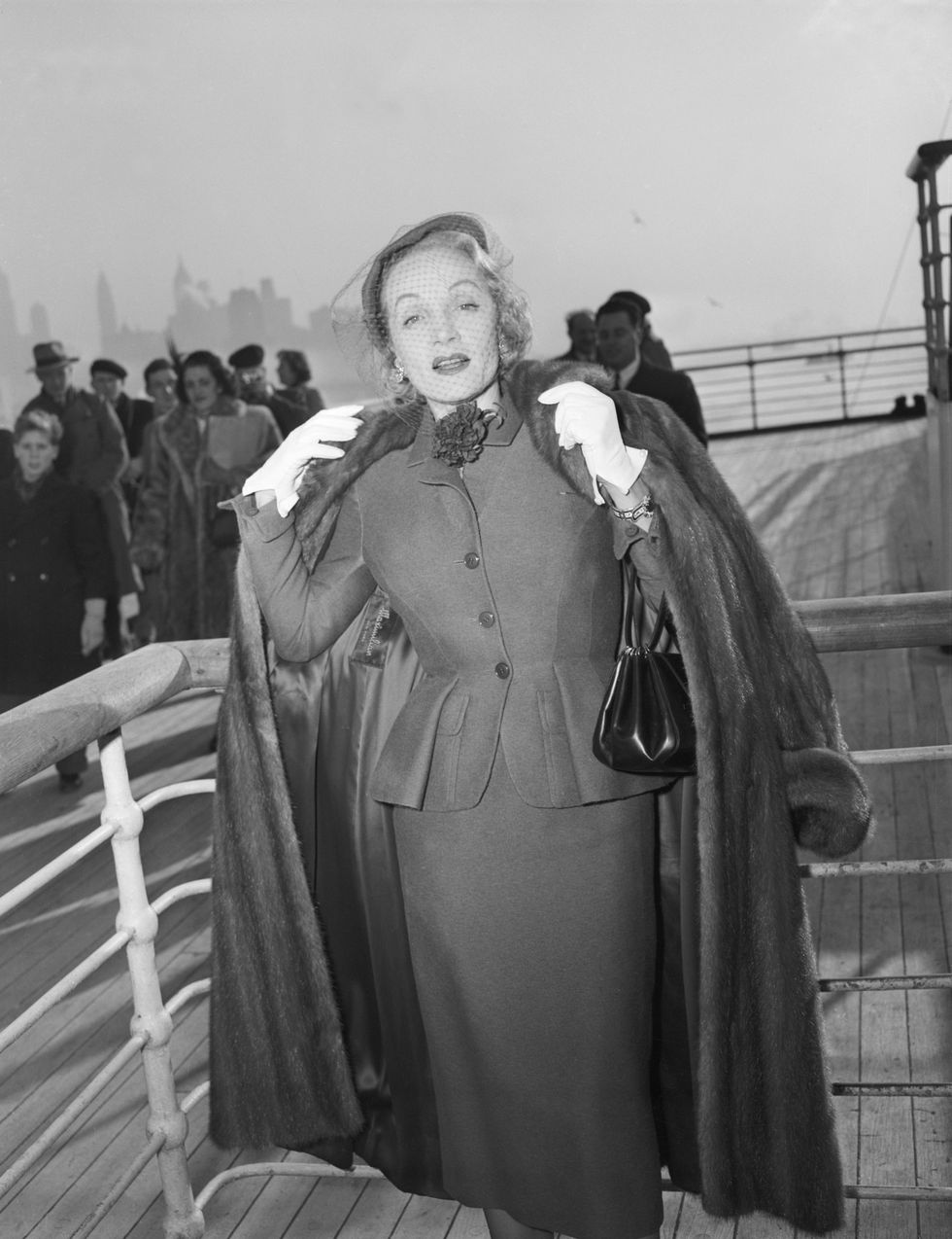 original caption 12211950 new york, new york  actress, marlene dietrich, unquestionably one of the most glamourous grandmothers in the world, shows herself to be little the worse for wear after her arrival at new york aboard the queen elizabeth