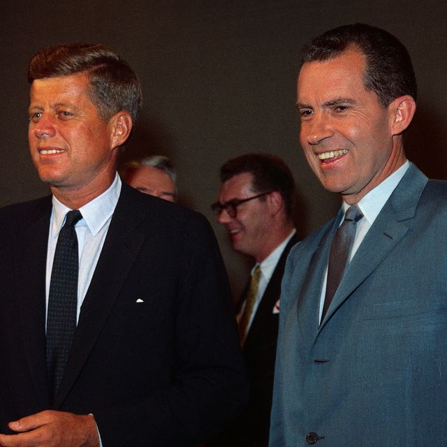 John F. Kennedy and Richard M. Nixon smiling for the cameras prior to their appearing on the first nationally televised presidential debate