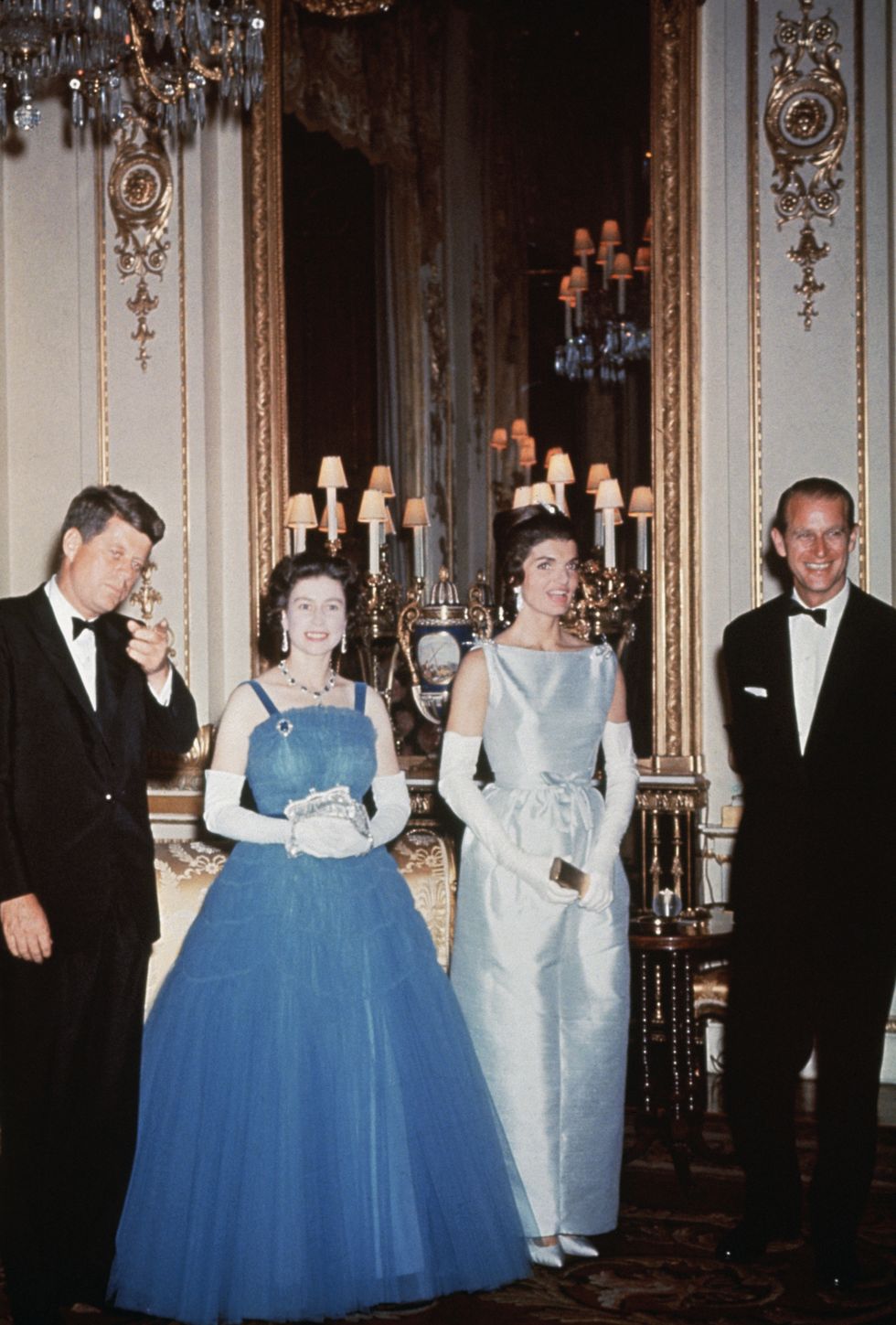 president john f kennedy and first lady jackie kennedy pay a visit to the royal family in england l r john f kennedy queen elizabeth ii jackie kennedy, and prince philip