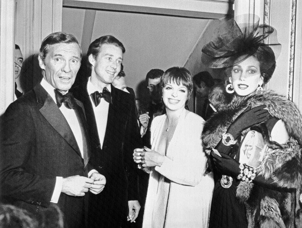 american businessman david j mahoney, american fashion designer halston, entertainer liza minelli and actress marisa berenson, during the private party given at maxim's in paris for the people who will attend the fund raising "grand advertisemnt a versailles" for the upkeep and restoration of versailles castle to be held at the castle