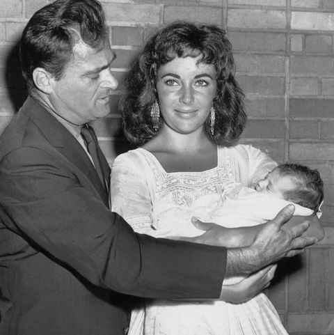 09031957 elizabeth taylor with baby, liza and husband mike todd leaving harkness pavilion for home
