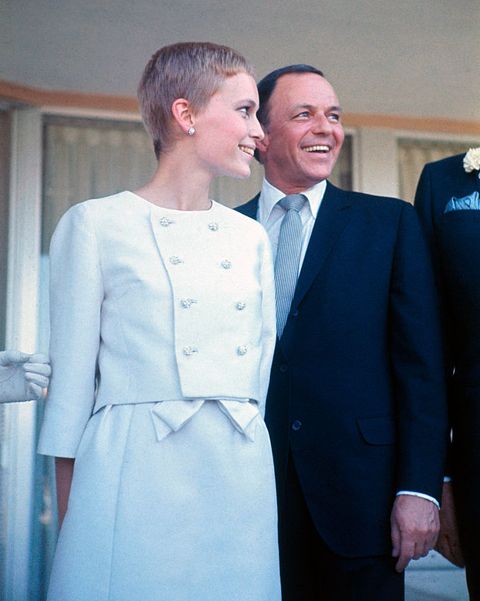 original caption frank sinatra and mia farrow are shown outside the sands hotel, following their wedding standing with them is mrs william goetz, who served as matron of honor