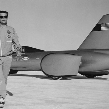 original caption craig breedlove, 26, of los angeles, driver and owner of the spirit of america walks away from his racer 731, after a successful trial run of 3495 mph