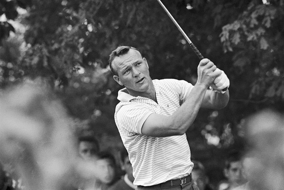 original caption arnold palmer tees off on the 10th hole with a good margin of lead over phil rodgers and jacky cupit palmer went on to win the world series playoff berth by defeating rodgers by 5 strokes and cupit by 7