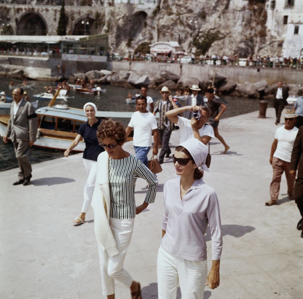 original caption mrs jacqueline kennedy and mrs agnelli on a pier in amalfi before embarking on the yacht agneta