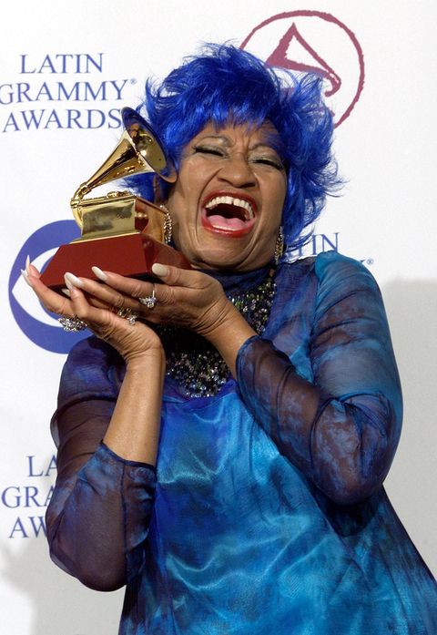 los angeles, united states  celia cruz poses with her grammy for best salsa performance at the 1st annual latin grammy awards at the staples center in los angeles, 13 september 2000   electronic image   afp photo   vince buccigb photo credit should read vince bucciafp via getty images