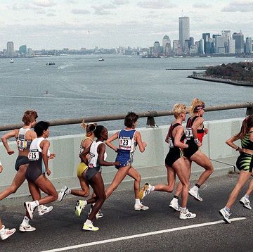 new york, united states the top women runners in the new york city marathon run on the verazzano narrows bridge with the manhattan skyline at rear just after the start 01 november eventual winner franca fiacconi of italy 2ndr and last years winner franziska rochar moser of switzerland 3rdr lead the pack afp photo stan honda photo credit should read stan hondaafp via getty images
